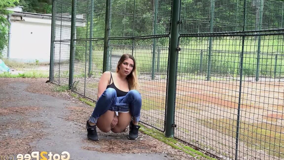 15P Sexy brunette Rebecca dropping jeans and white panties and pissing in public