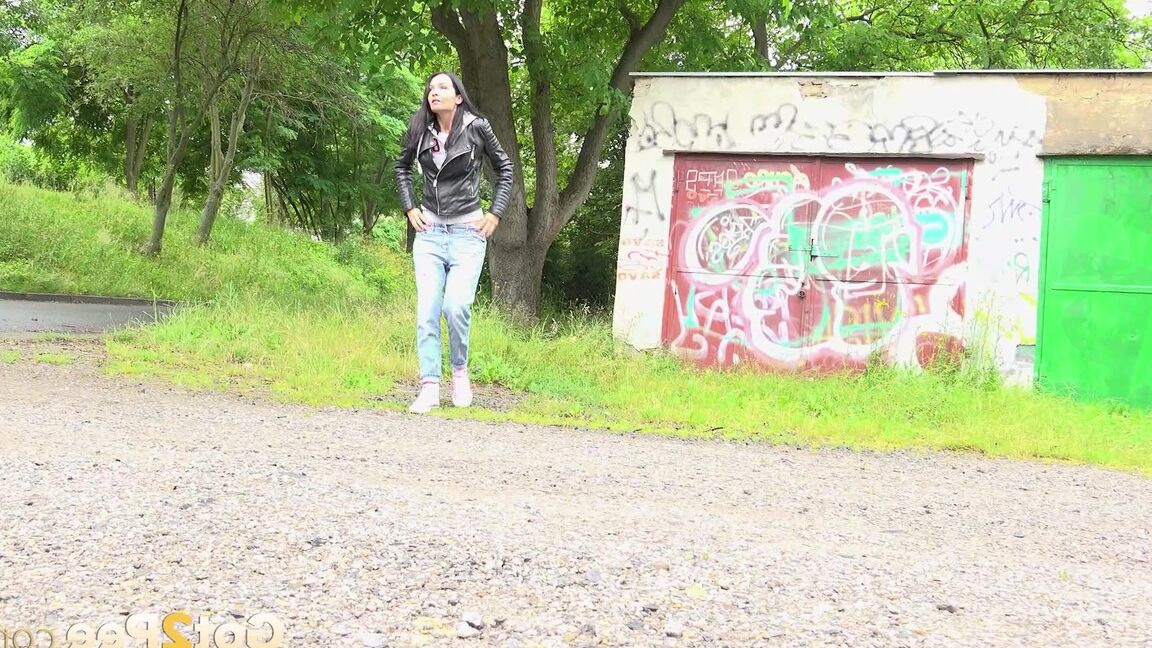 15P Solo girl with black hair squats for a piss on the side of a dirt road