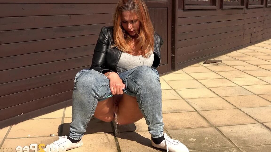 15P Ani Black finds the need to pee overwhelming and pisses on a public sidewalk