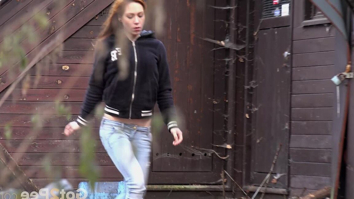 15P Cute redhead Sandra on a country walk pausing to squat for a hot outdoor pee