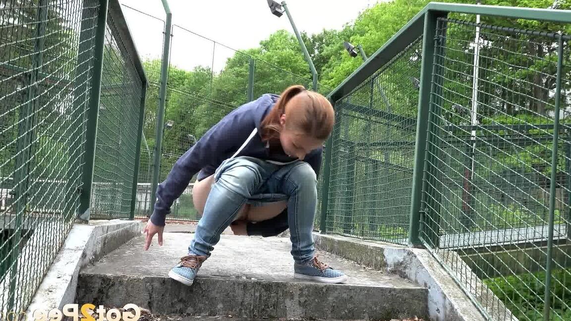 15P Antonia can't hold her pee any longer and relives herself on stone steps
