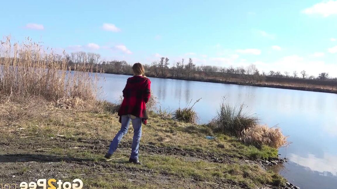 15P Cynthia Vellons squats and sprays an arc of piss