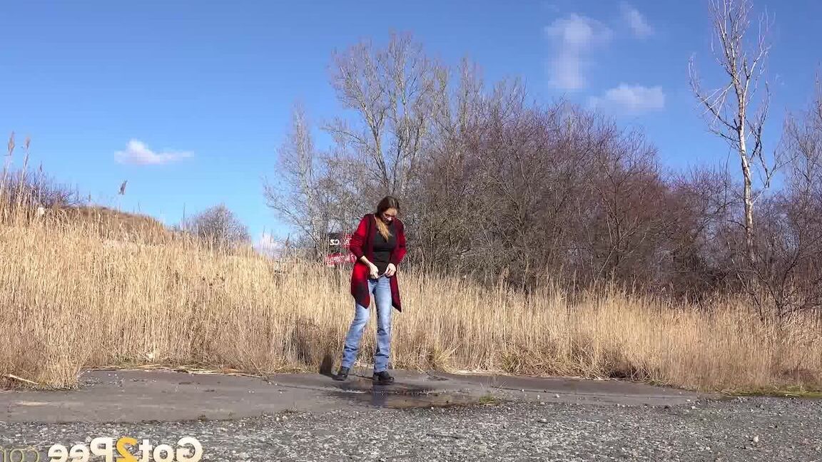 15P Cynthia Vellons squats and sprays an arc of piss