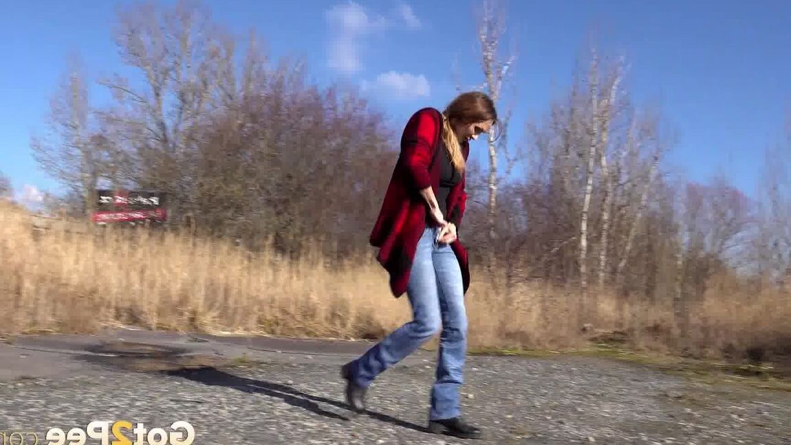15P Cynthia Vellons squats and sprays an arc of piss