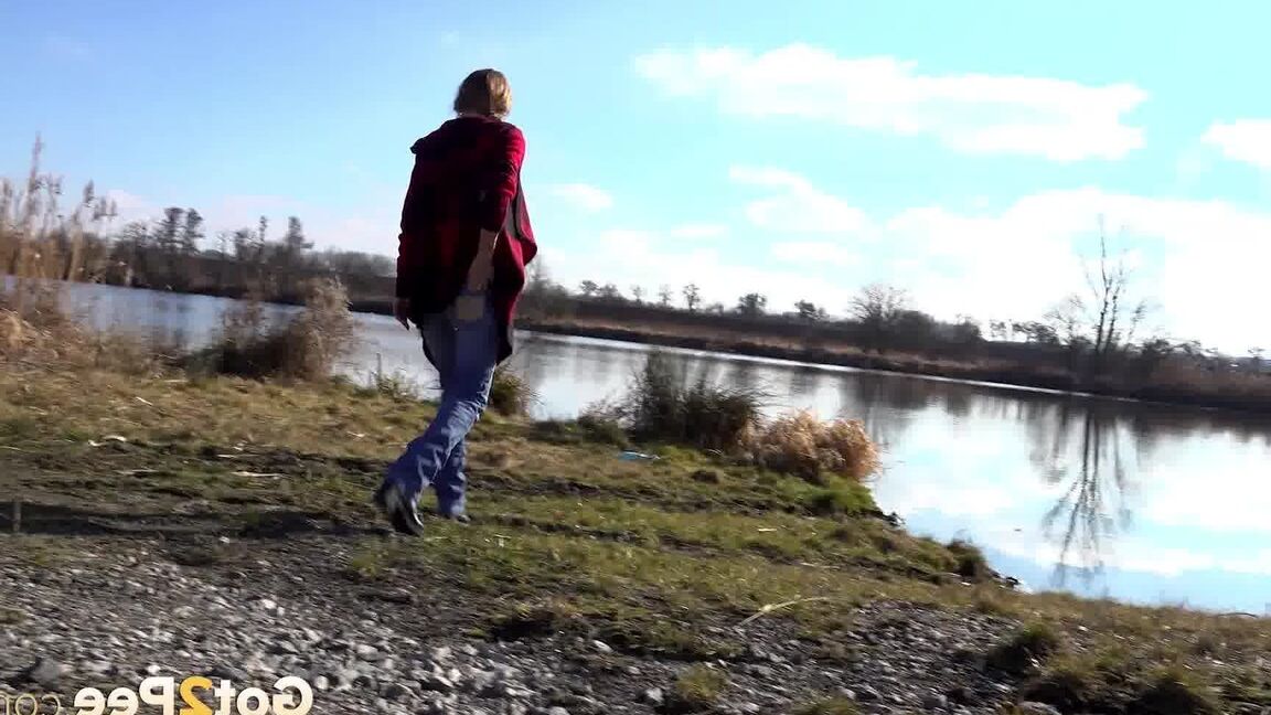15P Cynthia Vellons squats and sprays an arc of piss