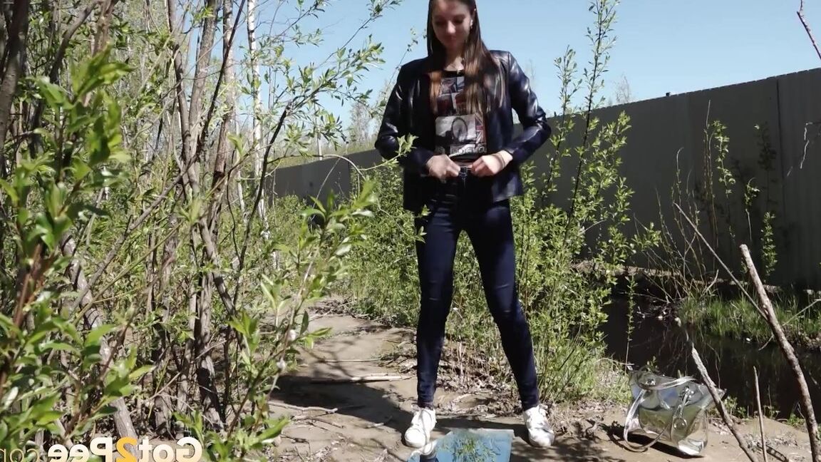 15P Distressed female Viktoria takes a badly needed piss on a mirror amid bushes