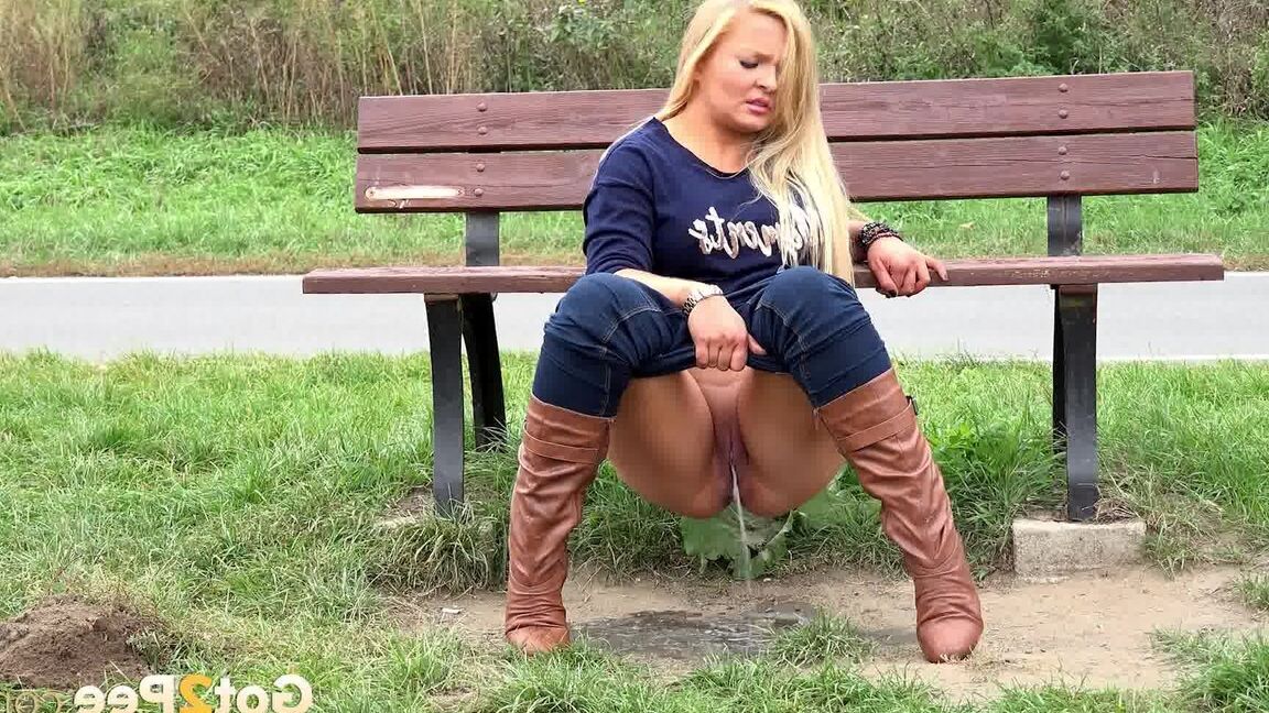 15P Thick blond chick Jenna Lovely squats for a piss next to bench beside the road
