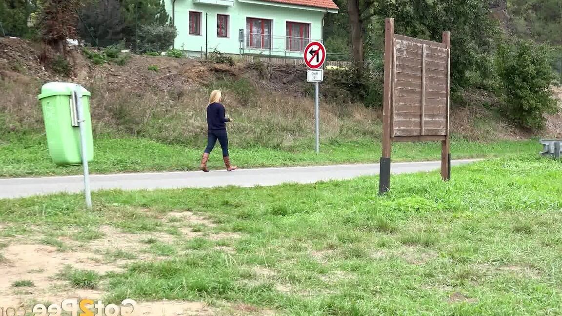 15P Thick blond chick Jenna Lovely squats for a piss next to bench beside the road
