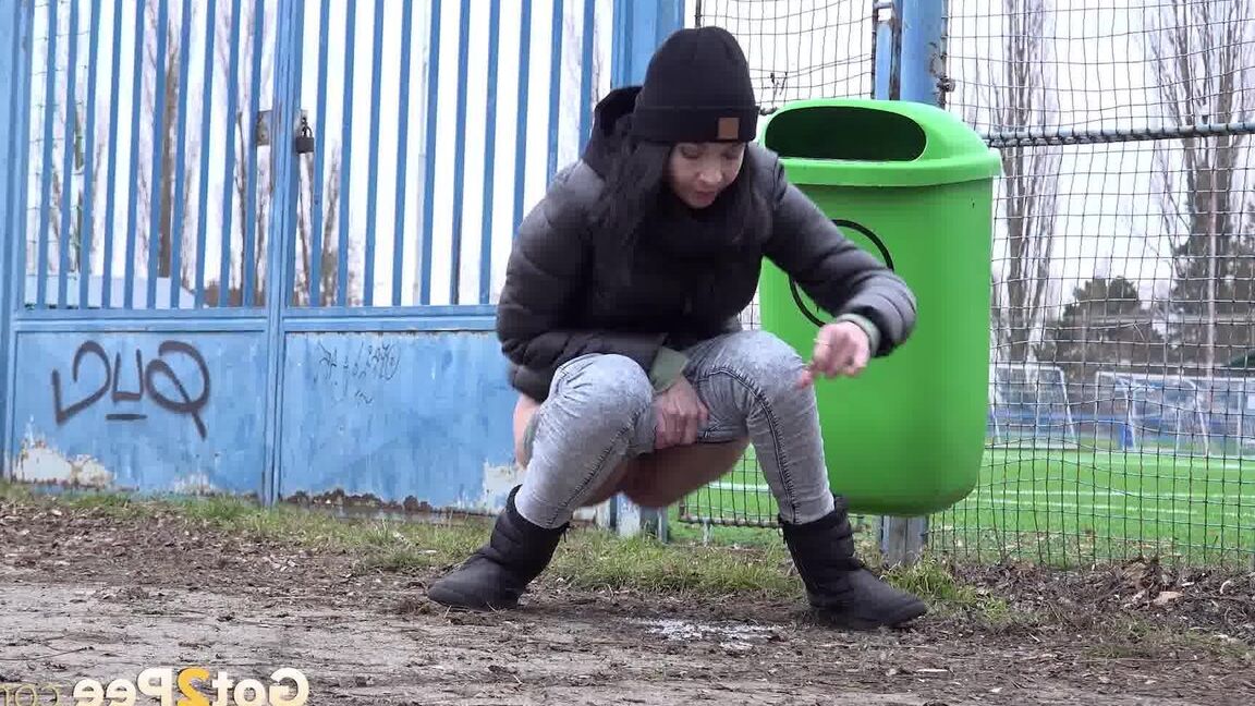 15P Hot babe Mistika squats and pees outside