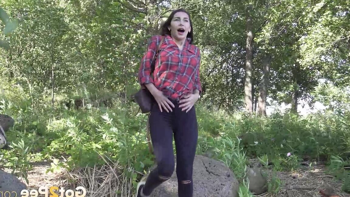 15P White girl Sasha squats for an urgent piss while in the great outdoors