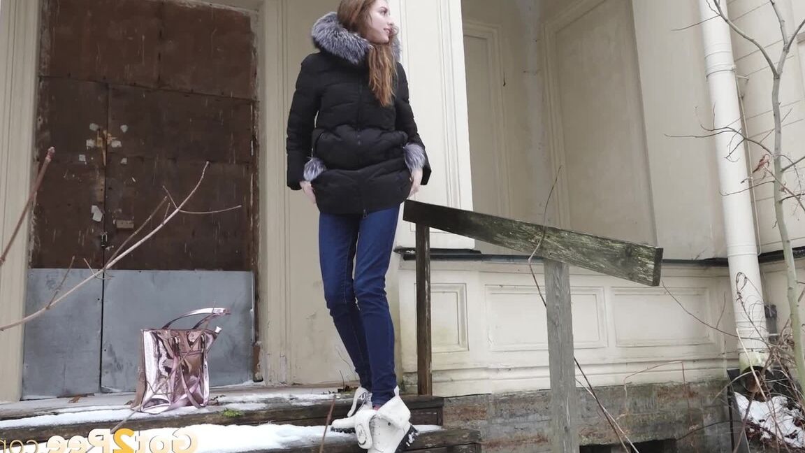 15P Distressed girl pulls down her jeans to pee on snow-covered steps