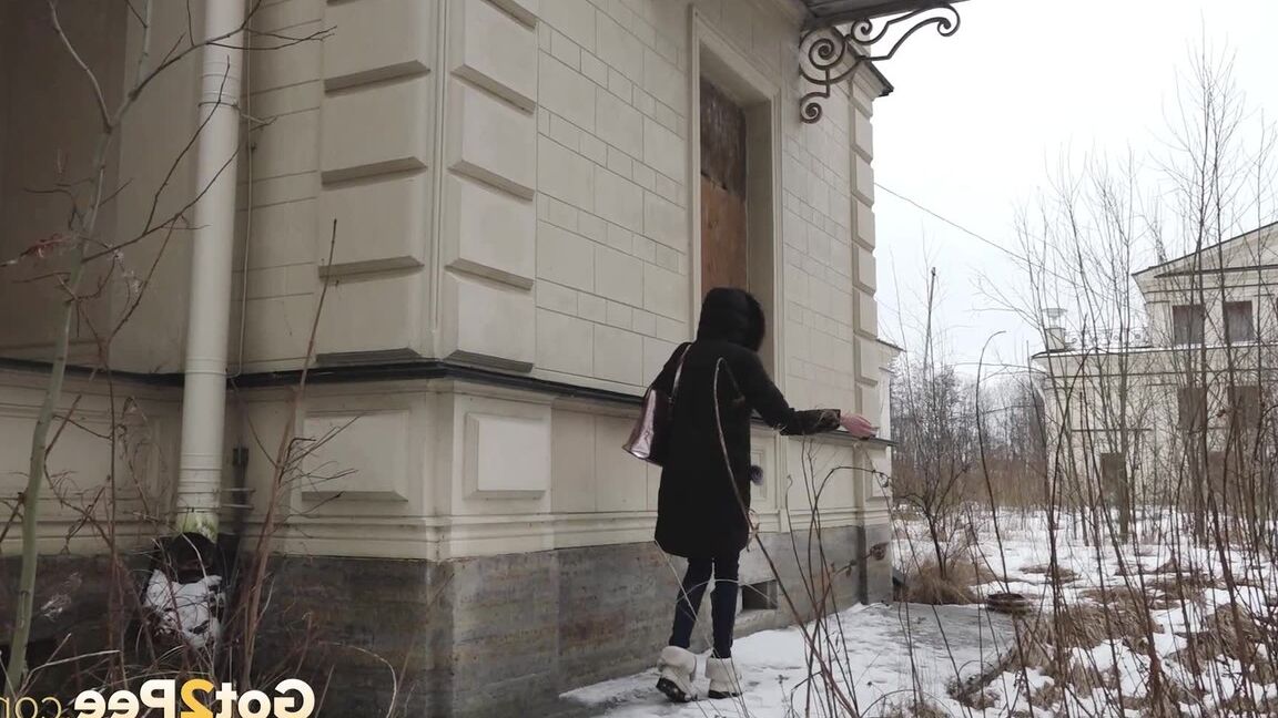 15P Distressed girl pulls down her jeans to pee on snow-covered steps