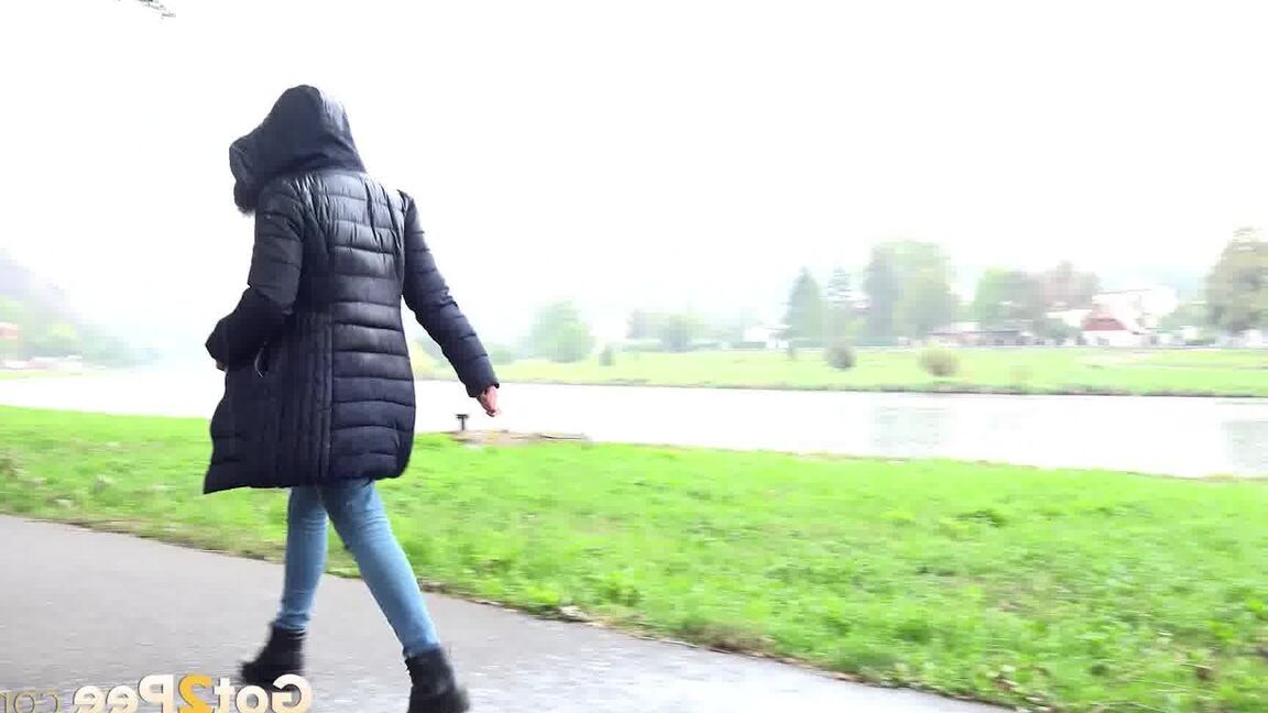 15P Gorgeous dark haired babe pees on the ground
