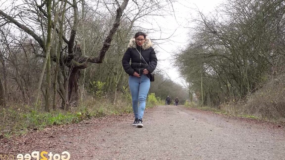 15P Solo girl Natasha Ink squats to pee on a country road while wearing a parka
