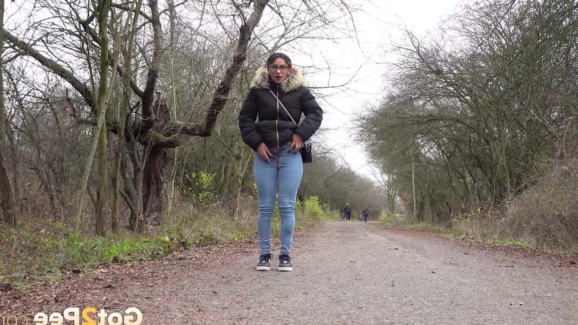 15P Solo girl Natasha Ink squats to pee on a country road while wearing a parka
