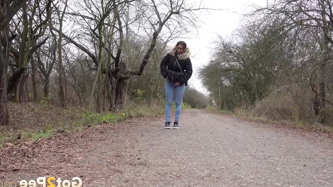 15P Solo girl Natasha Ink squats to pee on a country road while wearing a parka