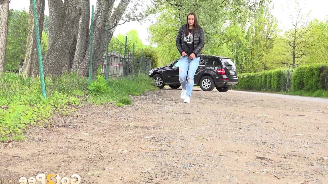 15P Solo girl Naomi Bennet takes a pee on a gravel roadway when caught short