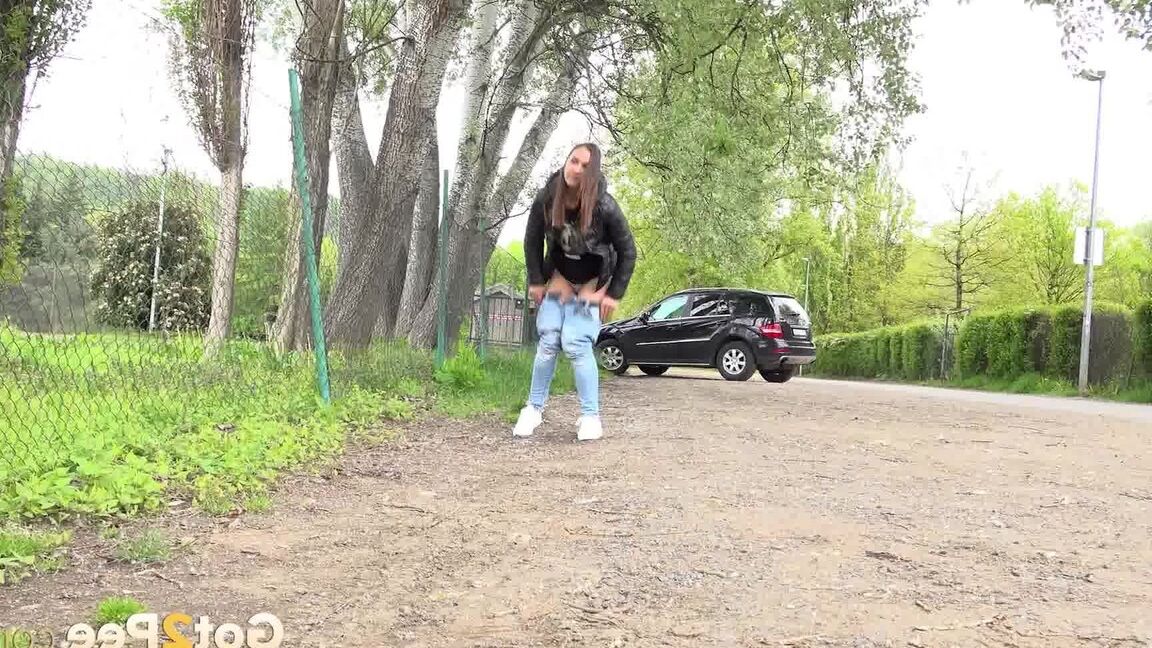 15P Solo girl Naomi Bennet takes a pee on a gravel roadway when caught short