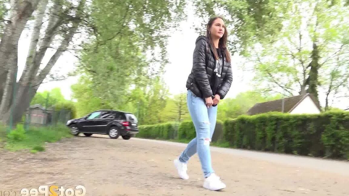 15P Solo girl Naomi Bennet takes a pee on a gravel roadway when caught short
