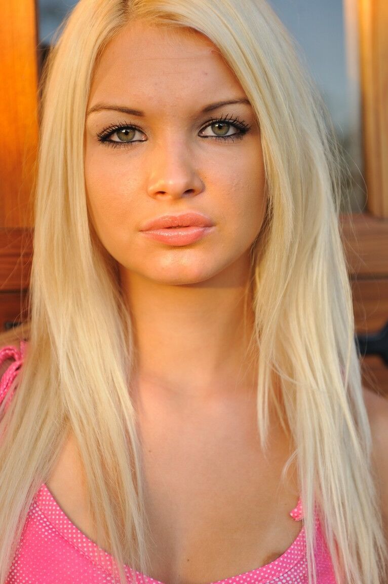 21P Glamorous blonde Franziska shows her slender body & masturbates with a banana