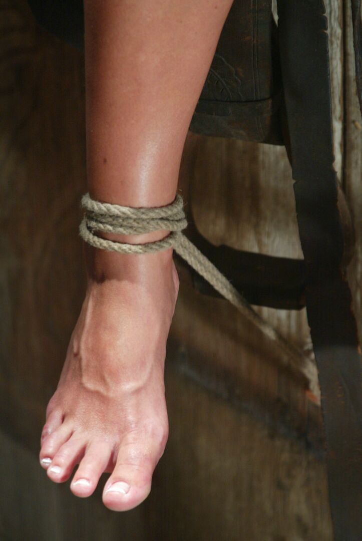 17P Blonde female Xana Star is tied up with rope before experiencing tit torture
