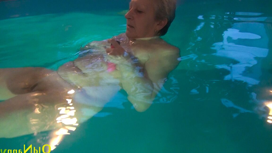 21P Horny granny Jitka masturbating in the pool during a nude swim session