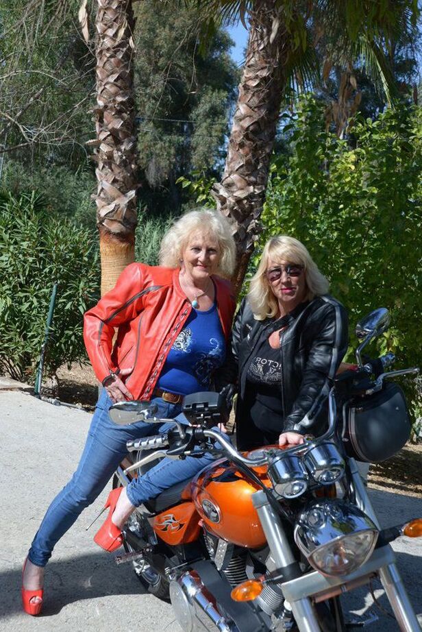 20P Mature blonde lesbians grope each others boobs while fully clothed