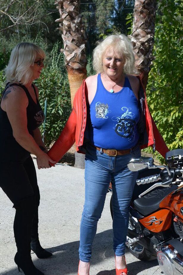 20P Mature blonde lesbians grope each others boobs while fully clothed