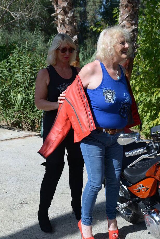 20P Mature blonde lesbians grope each others boobs while fully clothed