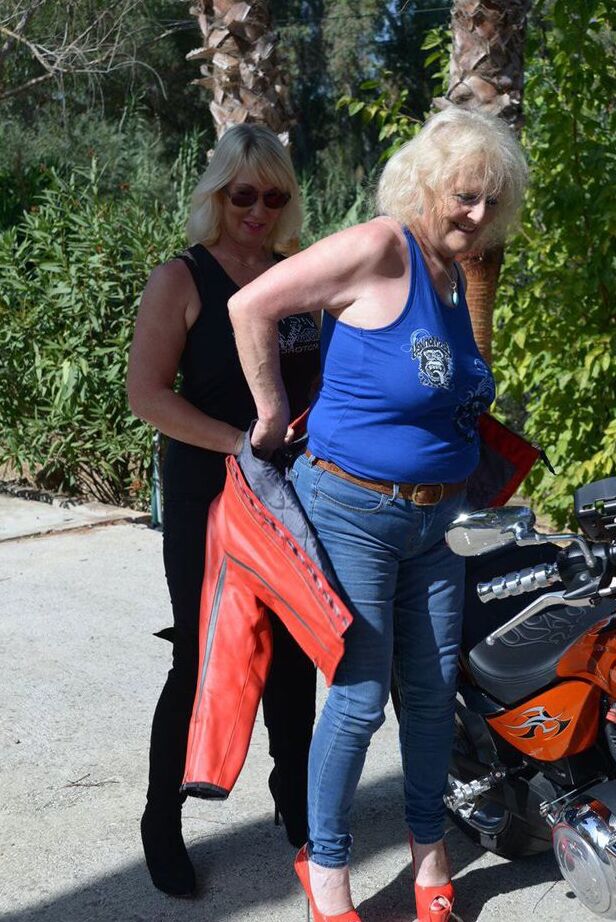 20P Mature blonde lesbians grope each others boobs while fully clothed