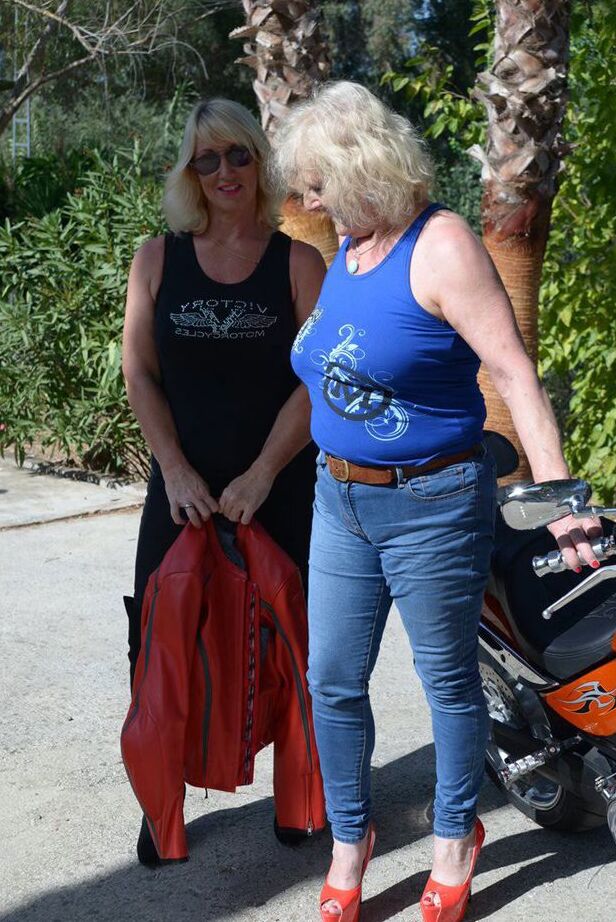 20P Mature blonde lesbians grope each others boobs while fully clothed