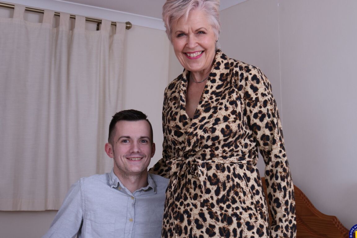 16P Older woman disrobes to nylons before licking her toy boy's toes and fucking