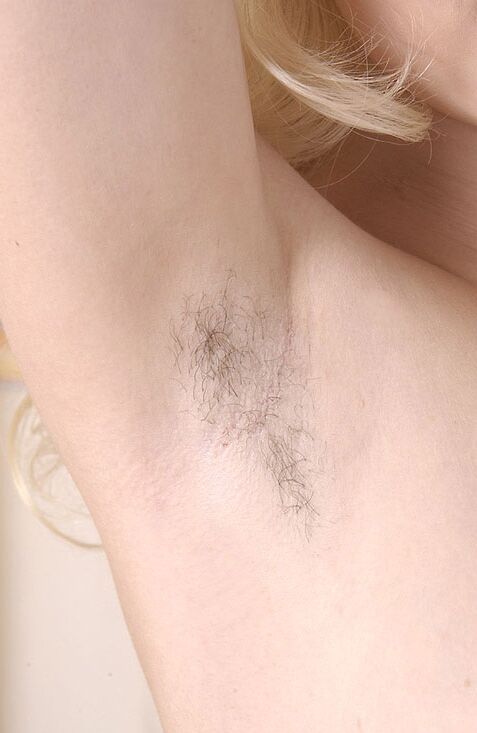 21P Blonde babe with a huge bosom Kate K reveals her hairy armpits in a solo