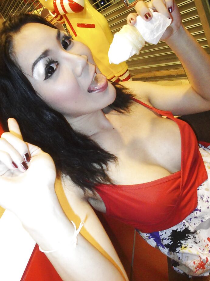 16P Wicked Asian tranny May giving a blowjob to man in public bathroom