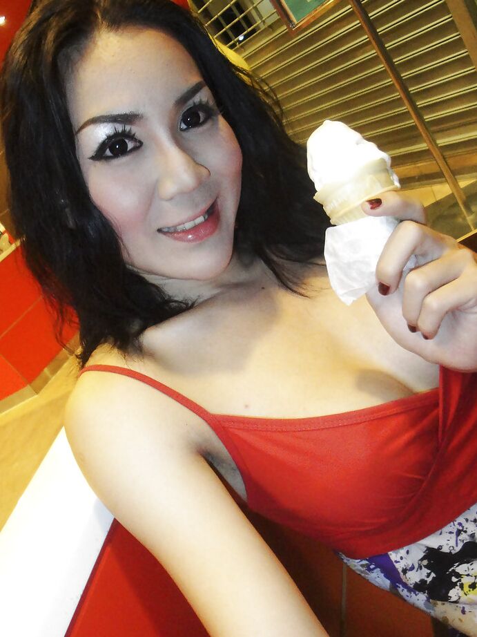 16P Wicked Asian tranny May giving a blowjob to man in public bathroom