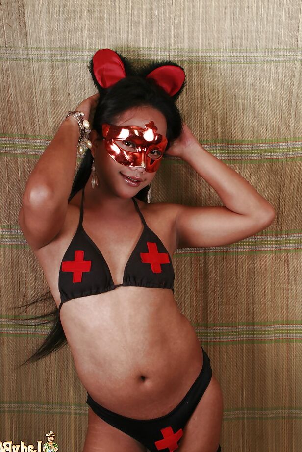 16P Solo Asian tranny Katrina posing solo in blindfold before baring tiny tits
