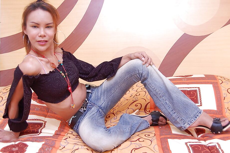 12P Ladyboy Sonya strips to proudly show off her bubble but and her dick