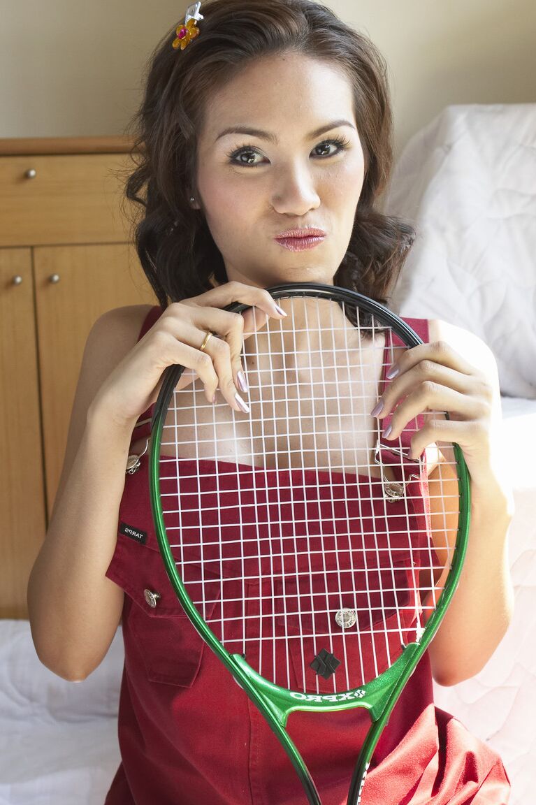 18P Shemale tennis player from Asia never puts aside her racket even posing naked