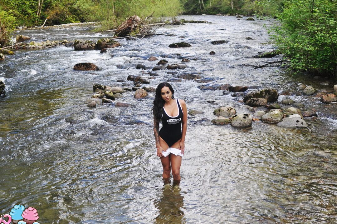 12P Latina teen Cindy Cupcakes pulls down her shorts while standing in a river