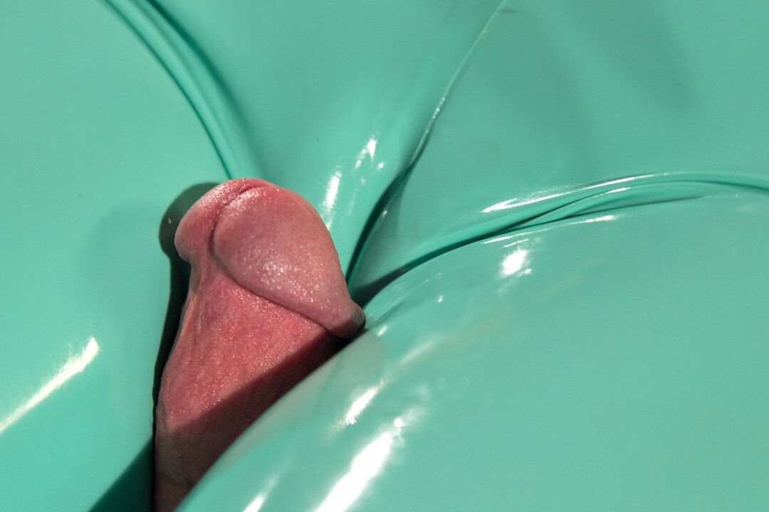 15P Clothed chick Mona Wales tortures a man's dick with the tease of latex pants