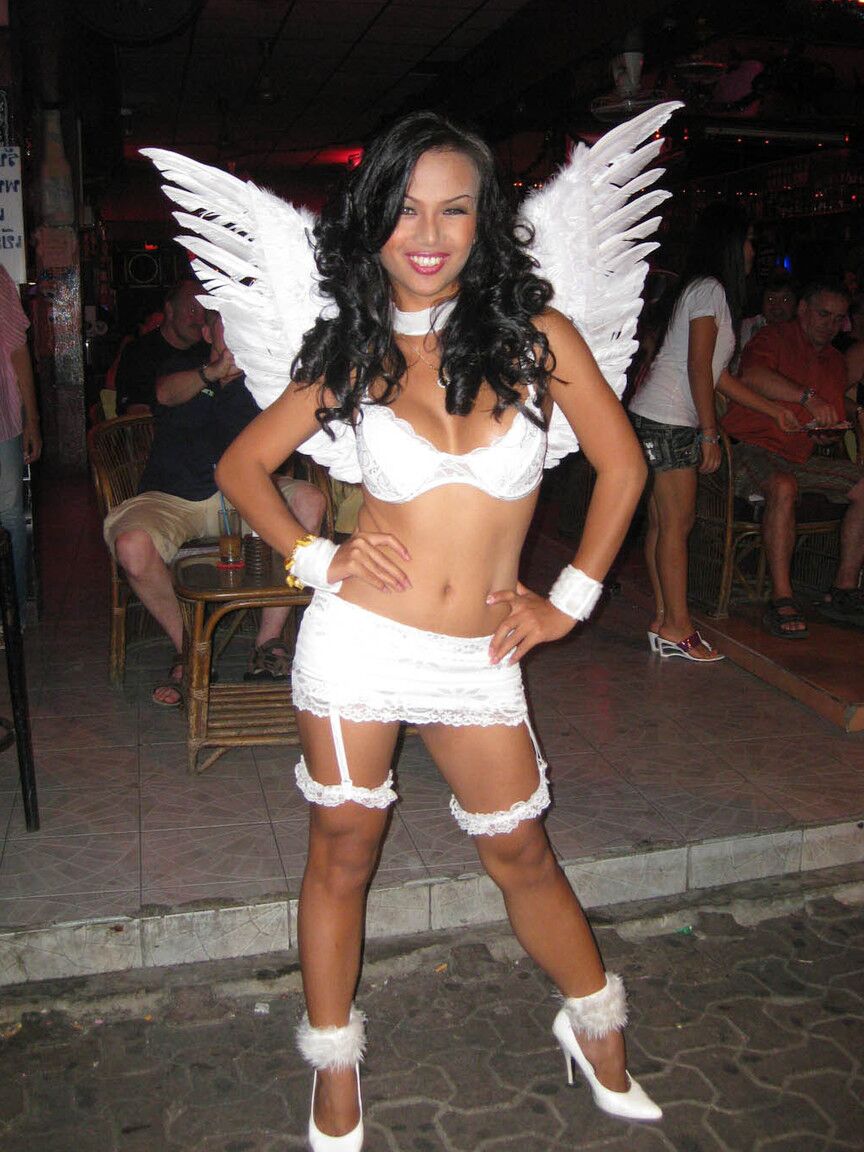 13P Beautiful Asian shemales posing in their provocative outfits in public