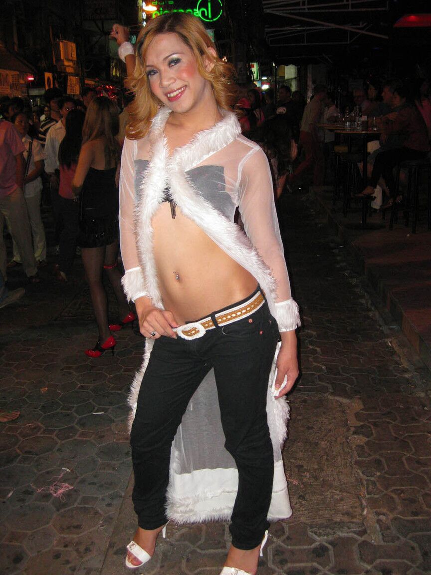 13P Beautiful Asian shemales posing in their provocative outfits in public