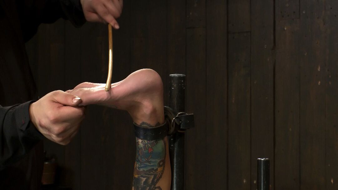 17P Gia DiMarco is restrained for torture session with the soles of her feet up