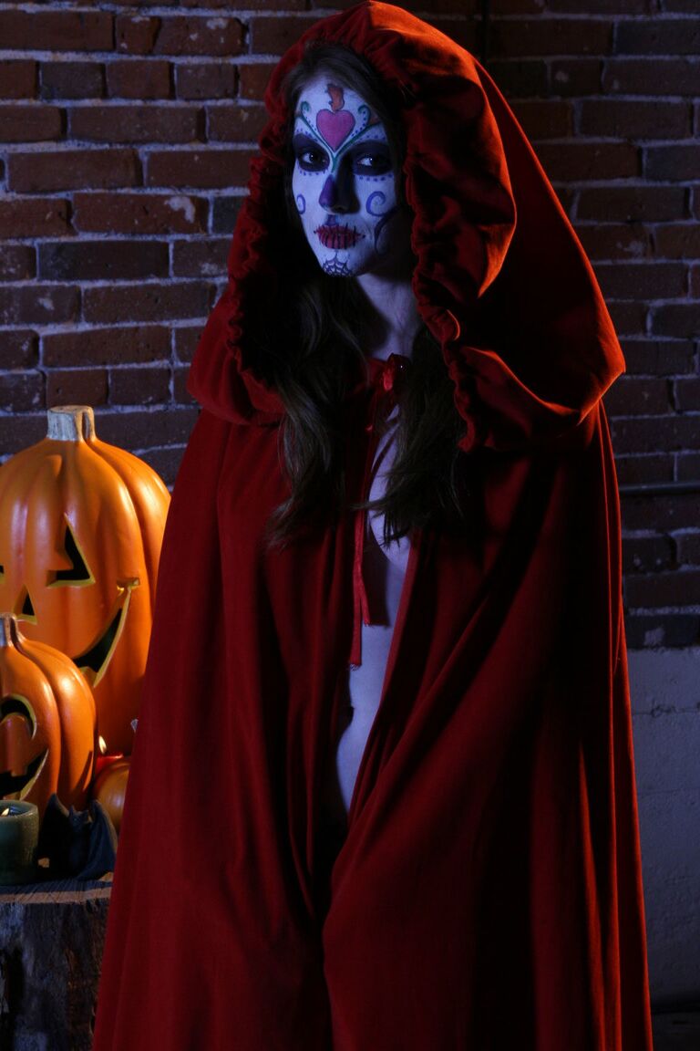 19P Little Red Ridding Hood Alexis Amore posing seductively with a long cape