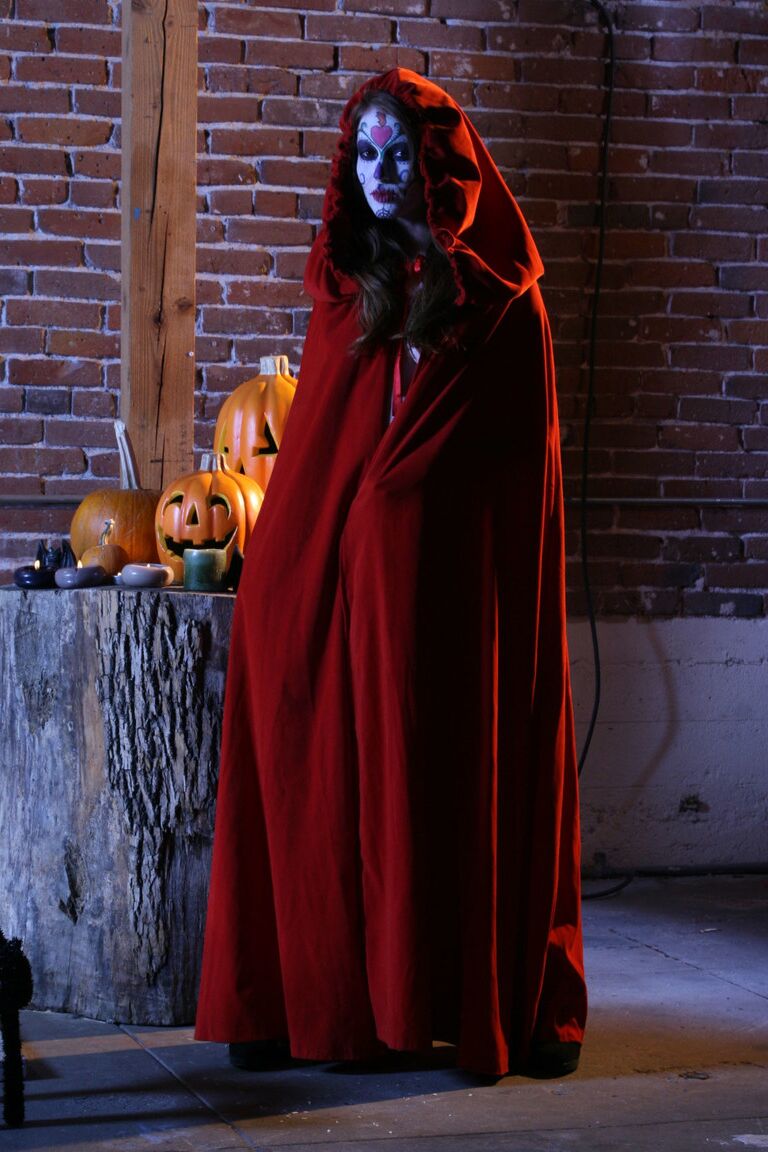 19P Little Red Ridding Hood Alexis Amore posing seductively with a long cape