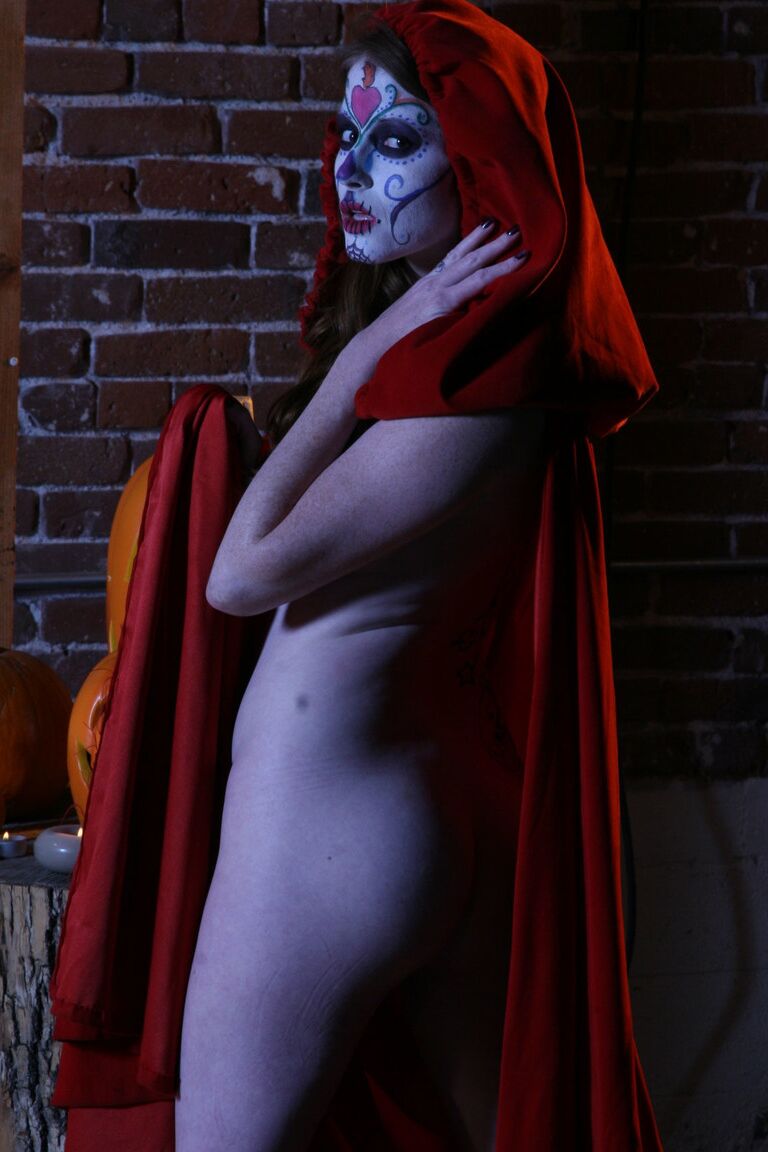 19P Little Red Ridding Hood Alexis Amore posing seductively with a long cape