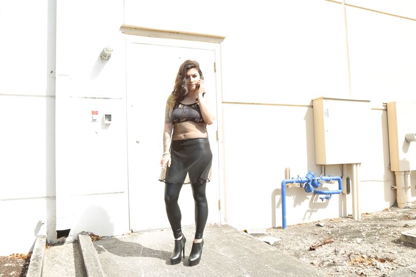 16P Latina model Lucy Deville posing for fully clothed candid shots outdoors