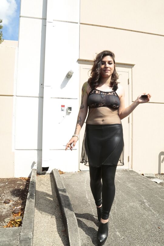 16P Latina model Lucy Deville posing for fully clothed candid shots outdoors
