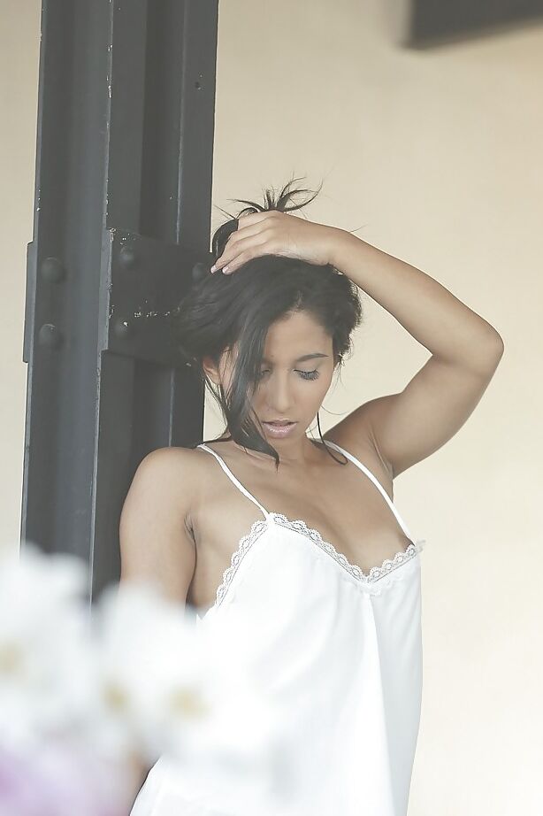 16P Young Latina Ria Rodrigez is posing and playing with her puss