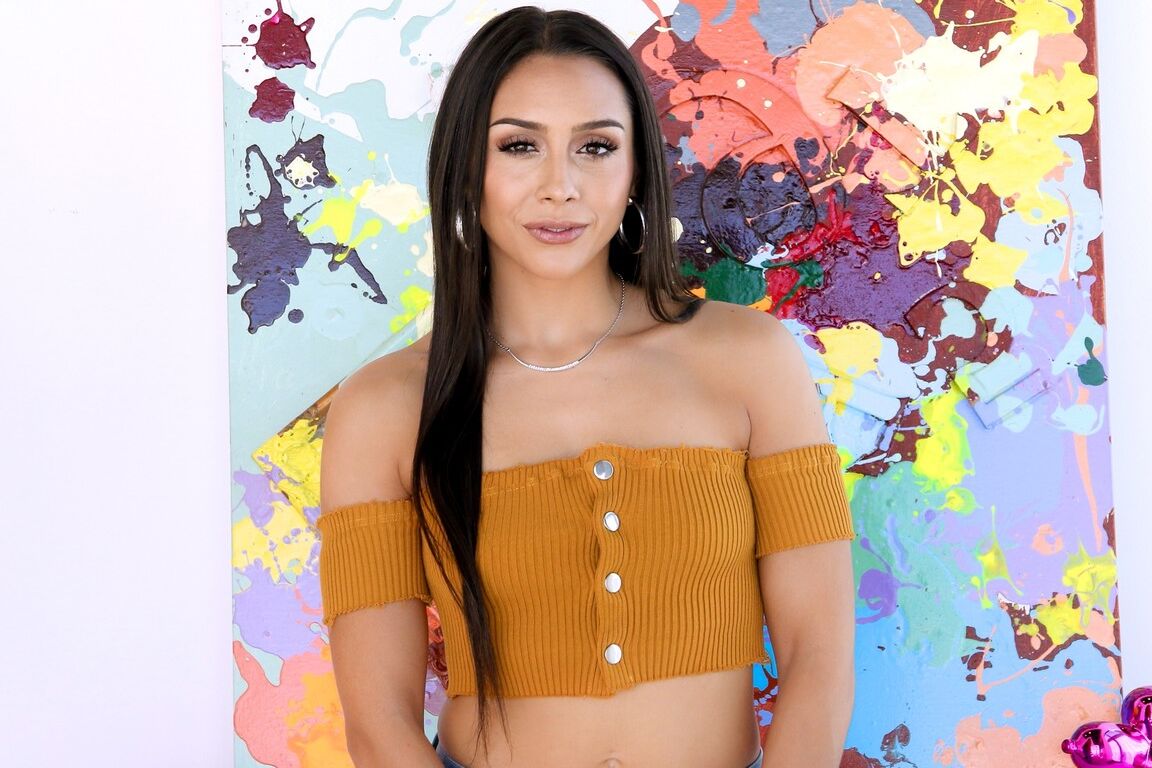 15P Hot Latina model Lilly Hall plays with her twat after disrobing